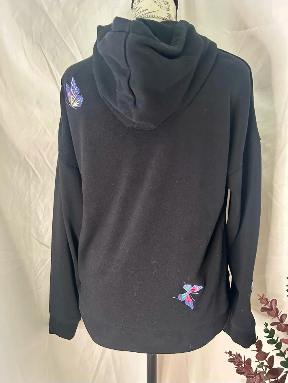 Women's Black Pullover Hoodie with Colorful Butterfly Accents